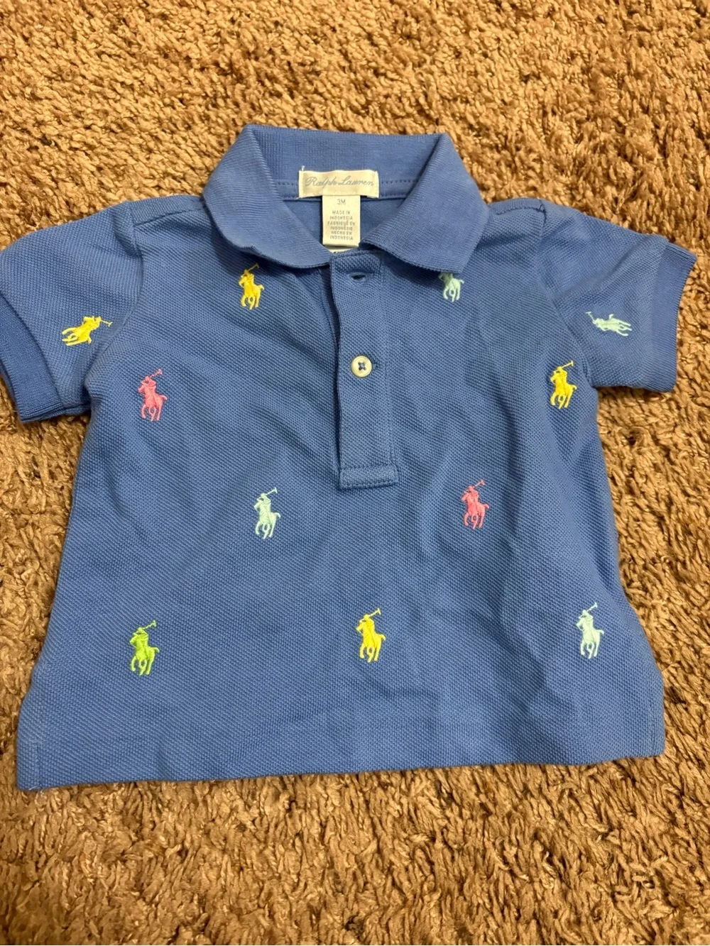 Like new Polo Ralph Lauren light blue polo shirt with colourful logo embroidery
